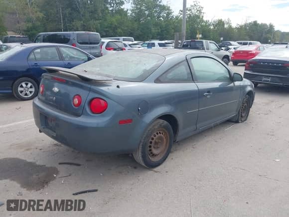 2006 Chevrolet Cobalt LS z VIN 1G1AK15F967621697, wystawiony jako IAAI lot #43236846 z przebiegiem 103 796 mil mil oraz . Historia ofert i sprzedaży dostępna na DreamBid. Obrazek 4.