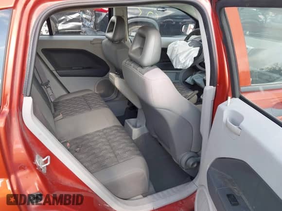 2007 Dodge Caliber with VIN 1B3HB28C97D198069, listed as a IAAI auction lot 42721624 with 143,427 mi miles and . Bid and sale history available at DreamBid. Image 8.