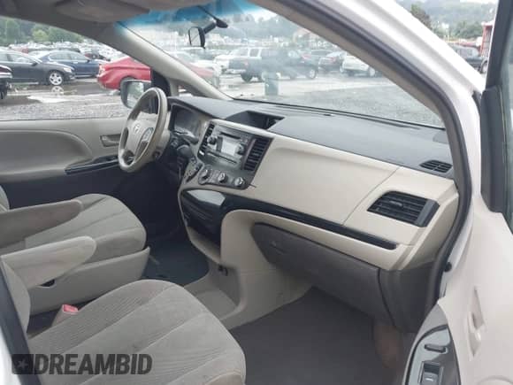 2014 Toyota Sienna L with VIN 5TDZK3DC1ES450560, listed as a IAAI auction lot 42907243 with Not provided miles and . Bid and sale history available at DreamBid. Image 5.