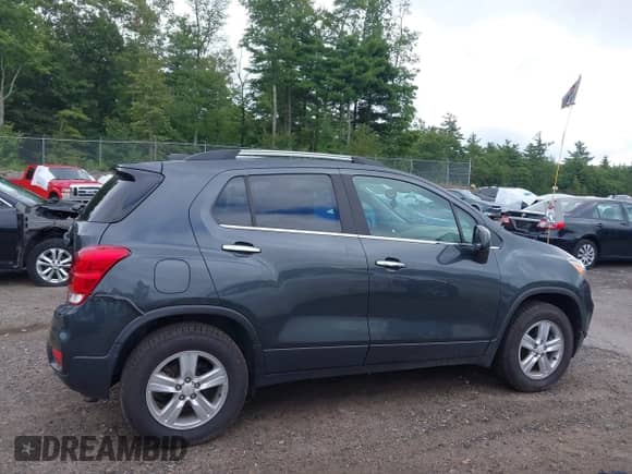 2018 Chevrolet Trax LT with VIN KL7CJPSB5JB666081, listed as a IAAI auction lot 43157128 with 125,245 mi miles and . Bid and sale history available at DreamBid. Image 13.