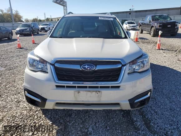 2018 Subaru Forester Premium z VIN JF2SJAEC2JH571704, wystawiony jako Copart lot #87062545 z przebiegiem 103 181 mil mil oraz Szkoda całkowita • Salvage title. Historia ofert i sprzedaży dostępna na DreamBid. Obrazek 5.