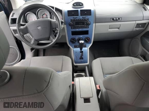 2007 Dodge Caliber R/T with VIN 1B3HE78KX7D299133, listed as a Copart auction lot 58249925 with 58,987 mi miles and Salvage title. Bid and sale history available at DreamBid. Image 8.