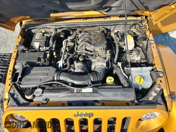 2014 Jeep Wrangler Sahara с VIN 1C4AJWBG1EL266289, выставлен на аукционе Copart как лот 81712295 с пробегом 128 403 миль миль и Списание • Salvage title. История ставок и продаж доступна на DreamBid. Изображение 11.