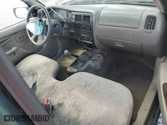 2002 Toyota Tacoma с VIN 5TENL42NX2Z025973, выставлен на аукционе Copart как лот 84580115 с пробегом 289 670 миль миль и Списание • Salvage title. История ставок и продаж доступна на DreamBid. Изображение 8.