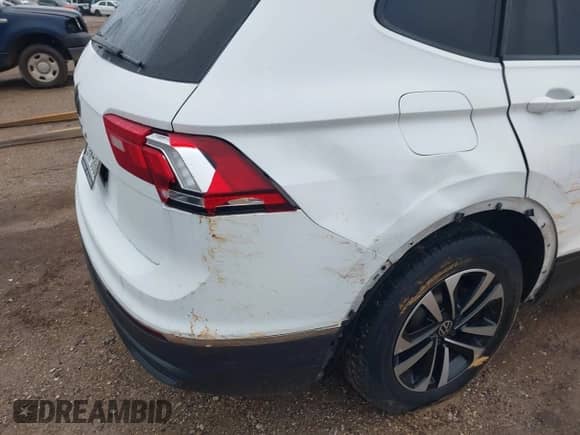 2022 Volkswagen Tiguan S z VIN 3VV1B7AX1NM144102, wystawiony jako IAAI lot #42324072 z przebiegiem 54 974 mil mil oraz . Historia ofert i sprzedaży dostępna na DreamBid. Obrazek 19.