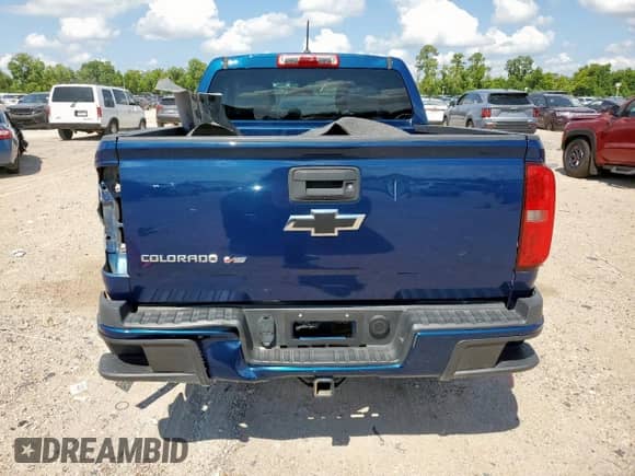 2019 Chevrolet Colorado 2WD Work Truck z VIN 1GCGSBEN4K1279863, wystawiony jako Copart lot #68920395 z przebiegiem 92 728 mil mil oraz Szkoda całkowita • Salvage title. Historia ofert i sprzedaży dostępna na DreamBid. Obrazek 6.