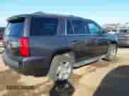 2017 Chevrolet Tahoe LT with VIN 1GNSKBKC0HR268910, listed as a IAAI auction lot 43566744 with 126,040 mi miles and . Bid and sale history available at DreamBid. Image 4.