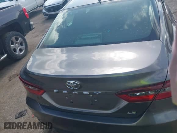 2021 Toyota Camry LE z VIN 4T1C11AK6MU594216, wystawiony jako IAAI lot #42732884 z przebiegiem 102 694 mil mil oraz . Historia ofert i sprzedaży dostępna na DreamBid. Obrazek 15.