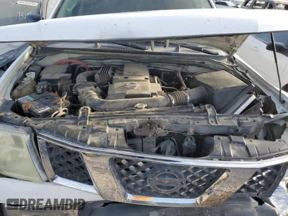 2005 Nissan Frontier Nismo с VIN 1N6AD07W15C410456, выставлен на аукционе Copart как лот 78011124 с пробегом 132 845 миль миль и Списание • Salvage title. История ставок и продаж доступна на DreamBid. Изображение 12.