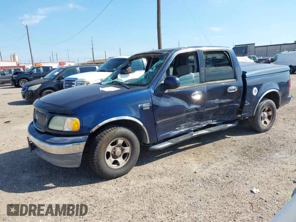 2003 Ford F-150 XLT z VIN 1FTRW07663KD61130, wystawiony jako IAAI lot #43331769 z przebiegiem 161 343 mil mil oraz . Historia ofert i sprzedaży dostępna na DreamBid. Obrazek 2.