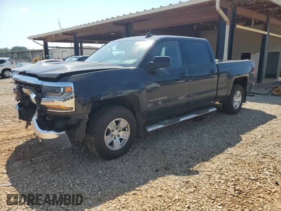 2018 Chevrolet Silverado 1500 LT с VIN 3GCUKREC7JG359703, выставлен на аукционе Copart как лот 69539785 с пробегом 243 935 миль миль и Списание • Salvage title. История ставок и продаж доступна на DreamBid. Изображение 1.