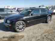 2005 Chrysler 300 300C AWD with VIN 2C3AK63H55H672324, listed as a Copart auction lot 48790925 with 258,543 mi miles and Salvage title. Bid and sale history available at DreamBid. Image 1.