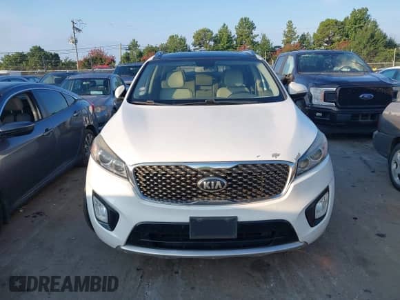 2016 Kia Sorento SXL z VIN 5XYPKDA57GG146717, wystawiony jako IAAI lot #43018518 z przebiegiem 180 078 mil mil oraz . Historia ofert i sprzedaży dostępna na DreamBid. Obrazek 12.
