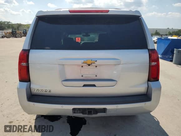 2020 Chevrolet Tahoe LS с VIN 1GNSKAKC9LR194812, выставлен на аукционе Copart как лот 70453565 с пробегом 64 893 миль миль и Списание • Salvage title. История ставок и продаж доступна на DreamBid. Изображение 6.