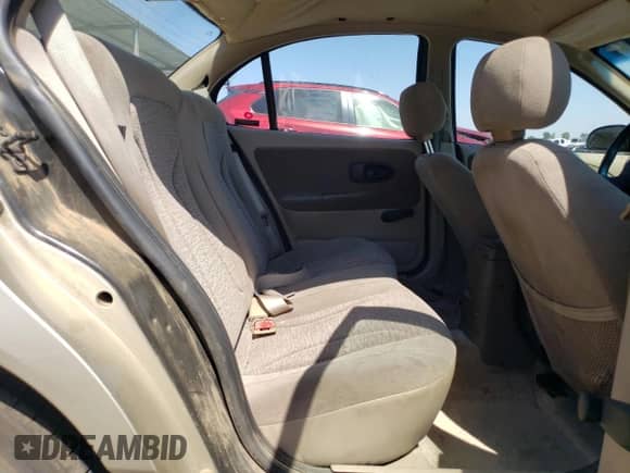 2000 Saturn SL with VIN 1G8ZK5274YZ103237, listed as a Copart auction lot 60558105 with 126,320 mi miles and Salvage title. Bid and sale history available at DreamBid. Image 10.