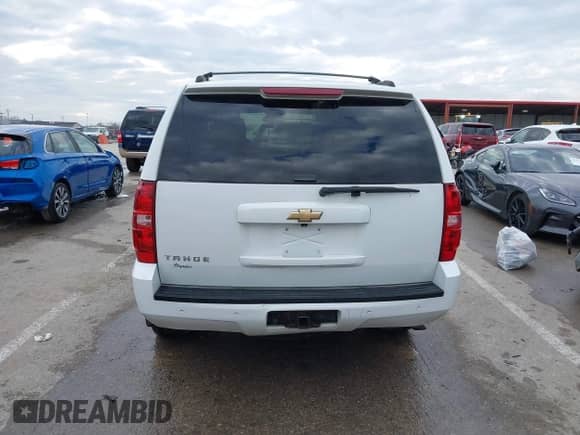 2007 Chevrolet Tahoe LTZ with VIN 1GNFK13057J100726, listed as a IAAI auction lot 41500768 with 262,065 mi miles and . Bid and sale history available at DreamBid. Image 16.