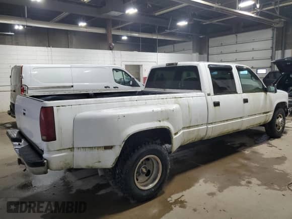1997 Chevrolet Silverado 3500 с VIN 1GCHC33J5VF002668, выставлен на аукционе Copart как лот 87199575 с пробегом 156 834 миль миль и Чистый • Clean title. История ставок и продаж доступна на DreamBid. Изображение 3.