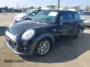 2014 MINI Hardtop with VIN WMWXM5C53ET934731, listed as a IAAI auction lot 43345367 with 48,628 mi miles and . Bid and sale history available at DreamBid. Image 2.