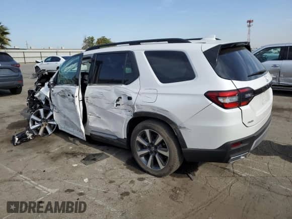 2025 Honda Pilot Elite with VIN 5FNYG1H81SB020096, listed as a Copart auction lot 70533595 with 12,951 mi miles and Salvage title. Bid and sale history available at DreamBid. Image 2.