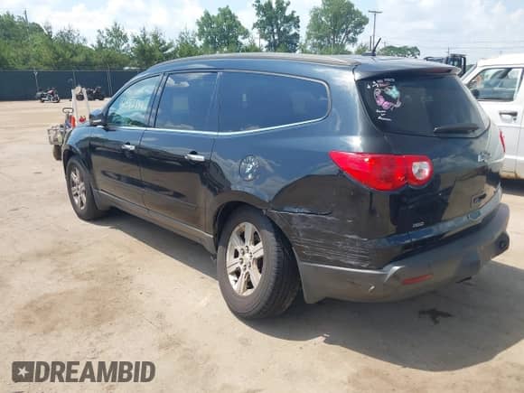 2012 Chevrolet Traverse 2LT with VIN 1GNKVJED6CJ330498, listed as a IAAI auction lot 42582844 with 131,057 mi miles and . Bid and sale history available at DreamBid. Image 3.