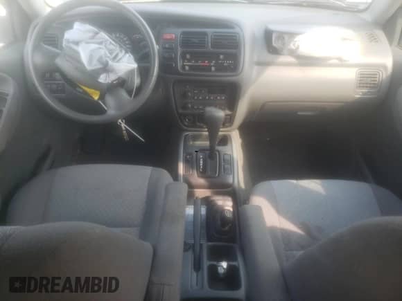 2003 Chevrolet Tracker with VIN 2CNBJ13C936947062, listed as a Copart auction lot 59820603 with 65,344 mi miles and Salvage title. Bid and sale history available at DreamBid. Image 8.