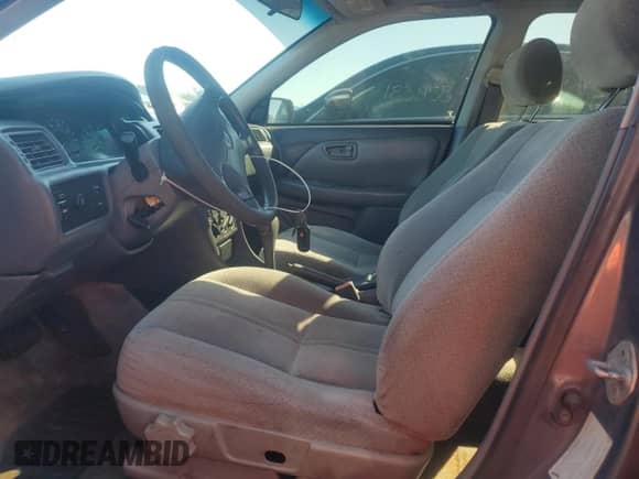 2000 Toyota Camry CE с VIN 4T1BG28KXYU941252, выставлен на аукционе Copart как лот 85308365 с пробегом 14 088 миль миль и На запчасти • Non repairable. История ставок и продаж доступна на DreamBid. Изображение 7.