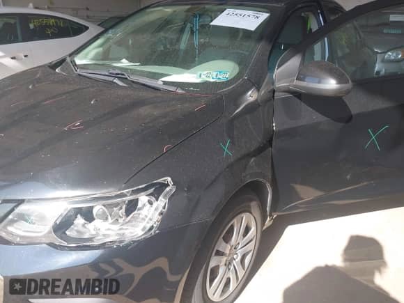 2017 Chevrolet Sonic LS with VIN 1G1JB5SG5H4124641, listed as a IAAI auction lot 42551578 with 107,431 mi miles and . Bid and sale history available at DreamBid. Image 6.