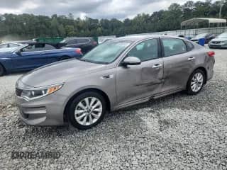 2016 Kia Optima EX with VIN 5XXGU4L32GG119340, listed as a Copart auction lot 84393645 with 126,595 mi miles and Salvage title. Bid and sale history available at DreamBid. Image 1.