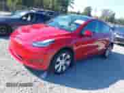2021 Tesla Model Y Long Range with VIN 5YJYGDEE2MF287066, listed as a IAAI auction lot 43253104 with 38,884 mi miles and . Bid and sale history available at DreamBid. Image 2.
