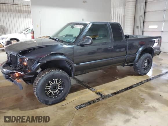 1998 Chevrolet S-10 LS with VIN 1GCCT19W7W8116291, listed as a Copart auction lot 68867615 with 129,205 mi miles and Salvage title. Bid and sale history available at DreamBid. Image 1.