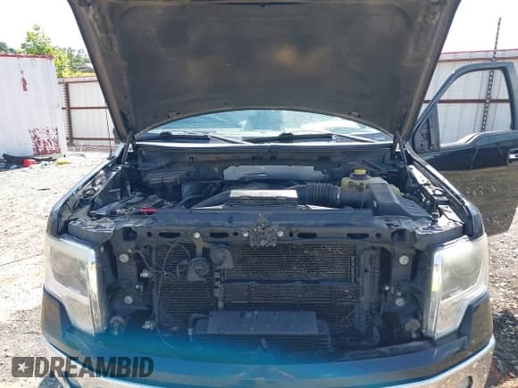 2014 Ford F-150 XL z VIN 1FTFW1ET4EKF06640, wystawiony jako IAAI lot #42372719 z przebiegiem 226 540 mil mil oraz . Historia ofert i sprzedaży dostępna na DreamBid. Obrazek 10.