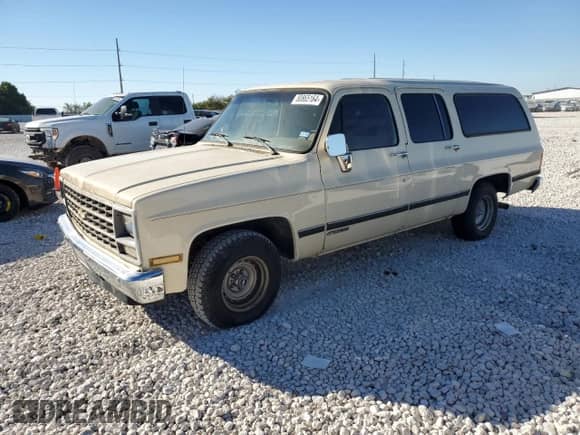 1990 Chevrolet Suburban с VIN 1GNER16K0LF169745, выставлен на аукционе Copart как лот 80865164 с пробегом 63 954 миль миль и Чистый • Clean title. История ставок и продаж доступна на DreamBid. Изображение 1.