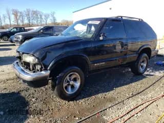 2000 Chevrolet Blazer LS с VIN 1GNCS18W4YK247518, выставлен на аукционе Copart как лот 79686403 с пробегом 235 660 миль миль и На запчасти • Non repairable. История ставок и продаж доступна на DreamBid. Изображение 1.