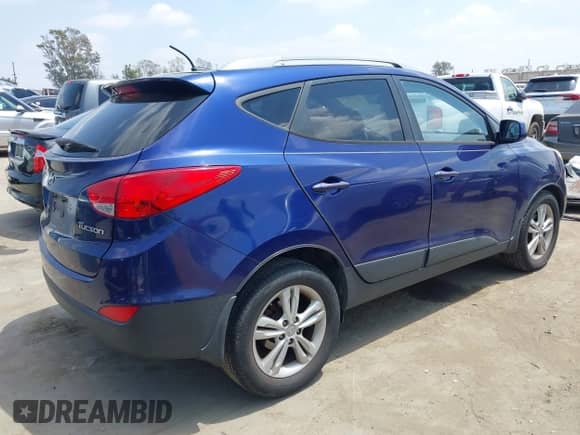 2011 Hyundai Tucson Limited z VIN KM8JU3AC3BU198325, wystawiony jako IAAI lot #42140793 z przebiegiem 121 509 mil mil oraz . Historia ofert i sprzedaży dostępna na DreamBid. Obrazek 4.