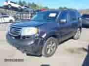 2014 Honda Pilot EX-L with VIN 5FNYF4H71EB025413, listed as a IAAI auction lot 42134357 with 145,865 mi miles and . Bid and sale history available at DreamBid. Image 2.