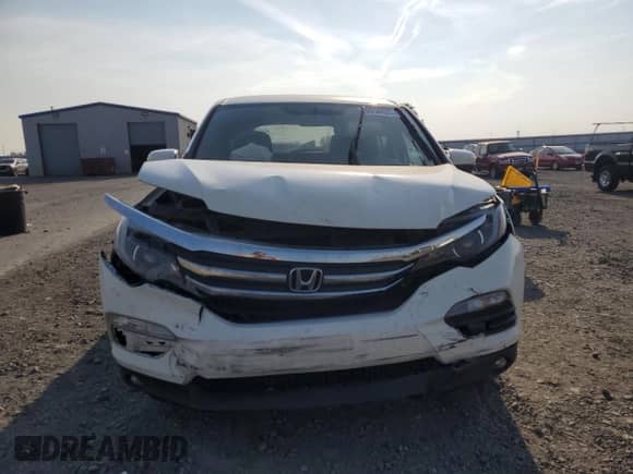 2018 Honda Pilot EX с VIN 5FNYF6H3XJB071115, выставлен на аукционе Copart как лот 70958925 с пробегом 100 106 миль миль и Списание • Salvage title. История ставок и продаж доступна на DreamBid. Изображение 5.