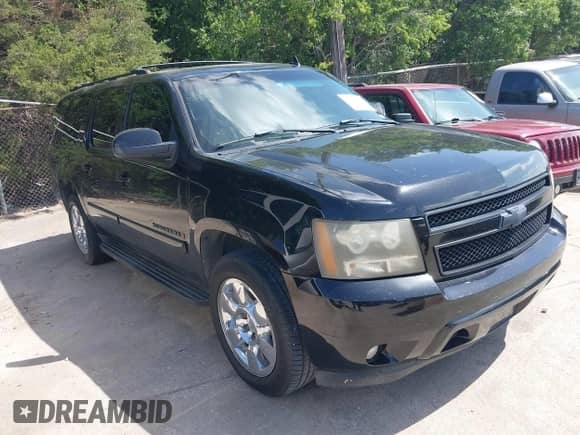 2007 Chevrolet Suburban LT with VIN 3GNFC16057G212162, listed as a IAAI auction lot 42571842 with 233,932 mi miles and . Bid and sale history available at DreamBid. Image 1.