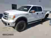 2013 Ford F-150 XLT with VIN 1FTFW1ET5DFC51150, listed as a Copart auction lot 82212615 with 344,930 mi miles and Salvage title. Bid and sale history available at DreamBid. Image 1.