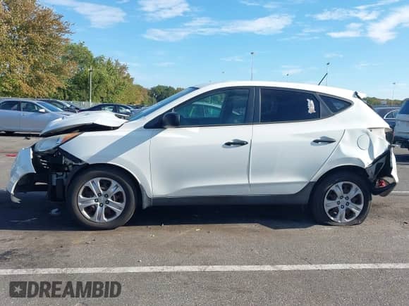 2012 Hyundai Tucson GL z VIN KM8JT3AB9CU447741, wystawiony jako IAAI lot #43370135 z przebiegiem 115 880 mil mil oraz . Historia ofert i sprzedaży dostępna na DreamBid. Obrazek 14.