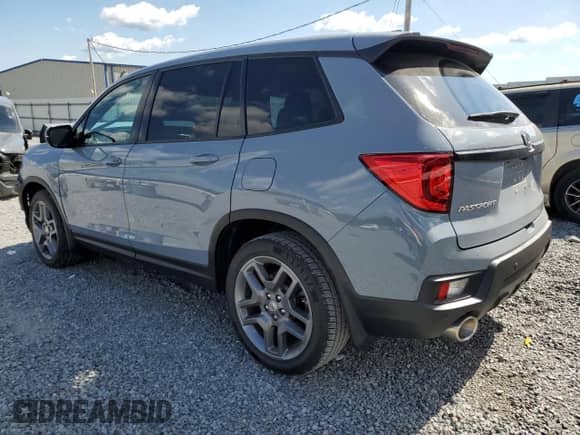 2022 Honda Passport EX-L with VIN 5FNYF7H50NB000681, listed as a Copart auction lot 71776765 with 57,154 mi miles and Salvage title. Bid and sale history available at DreamBid. Image 2.