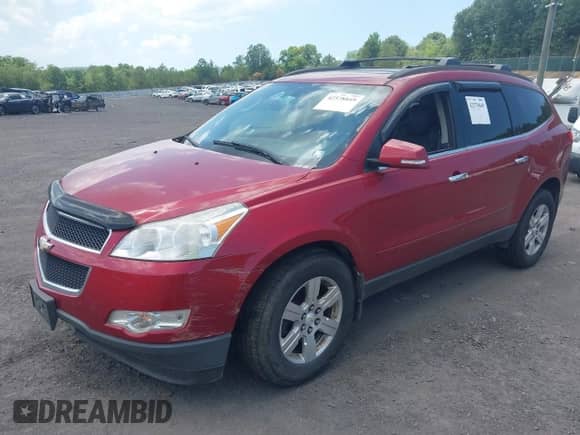 2012 Chevrolet Traverse 2LT with VIN 1GNKVJED6CJ196253, listed as a IAAI auction lot 42578849 with Not provided miles and . Bid and sale history available at DreamBid. Image 2.