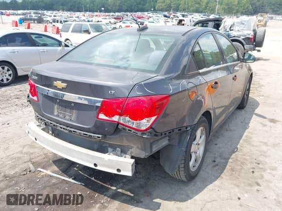 2015 Chevrolet Cruze LT with VIN 1G1PC5SB7F7232735, listed as a IAAI auction lot 43015393 with 154,308 mi miles and . Bid and sale history available at DreamBid. Image 4.