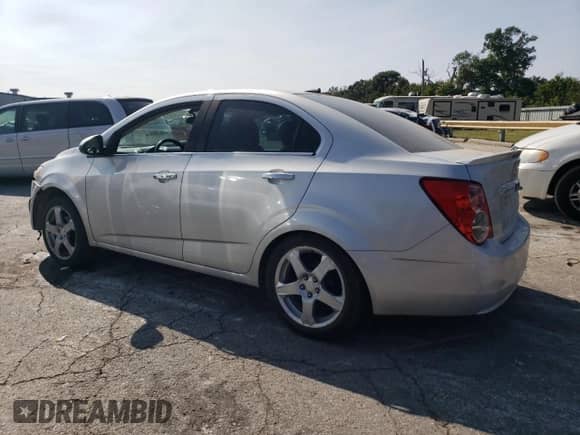 2014 Chevrolet Sonic LTZ with VIN 1G1JE5SB6E4215697, listed as a Copart auction lot 70820024 with 166,414 mi miles and Salvage title. Bid and sale history available at DreamBid. Image 2.