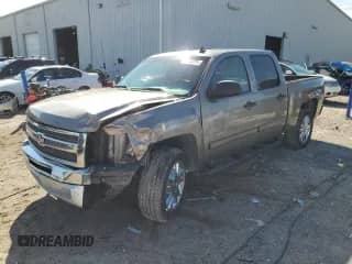 2012 Chevrolet Silverado 1500 LT с VIN 3GCPCSE07CG256808, выставлен на аукционе Copart как лот 82042265 с пробегом 158 351 миль миль и Списание • Salvage title. История ставок и продаж доступна на DreamBid. Изображение 1.