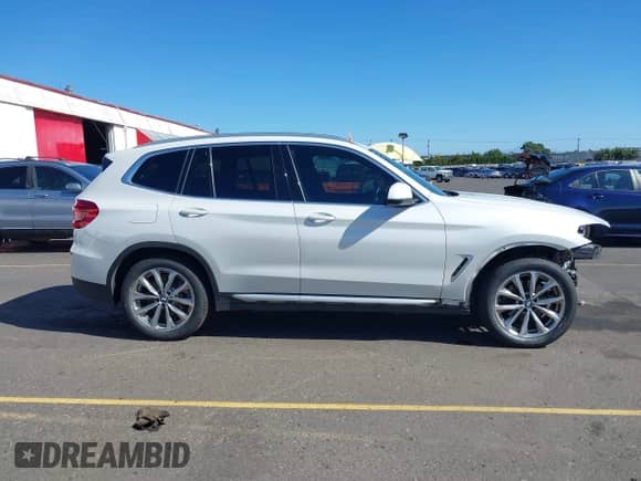 2018 BMW X3 xDrive30i with VIN 5UXTR9C52JLD71418, listed as a IAAI auction lot 43290842 with 59,044 mi miles and . Bid and sale history available at DreamBid. Image 14.