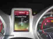 2014 Dodge Journey SE z VIN 3C4PDCAB2ET151405, wystawiony jako IAAI lot #42937930 z przebiegiem 134 778 mil mil oraz . Historia ofert i sprzedaży dostępna na DreamBid. Obrazek 7.