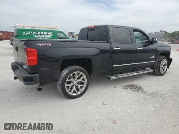 2014 Chevrolet Silverado 1500 High Country with VIN 3GCUKTEJ5EG319671, listed as a Copart auction lot 50453775 with Not provided miles and Salvage title. Bid and sale history available at DreamBid. Image 3.