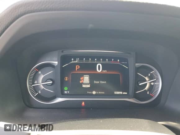 2024 Honda Passport EX-L with VIN 5FNYF8H5XRB018374, listed as a Copart auction lot 60676545 with 30,898 mi miles and Salvage title. Bid and sale history available at DreamBid. Image 9.