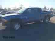 2003 Dodge Dakota SLT with VIN 1D7HG48N93S114891, listed as a IAAI auction lot 43348548 with 91,910 mi miles and . Bid and sale history available at DreamBid. Image 2.