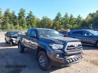 2019 Toyota Tacoma SR5 z VIN 5TFSZ5AN7KX210465, wystawiony jako IAAI lot #43252016 z przebiegiem 74 285 mil mil oraz . Historia ofert i sprzedaży dostępna na DreamBid. Obrazek 1.